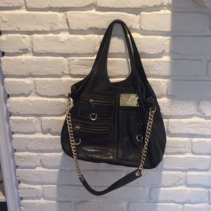 Black leather satchel. Excellent condition.